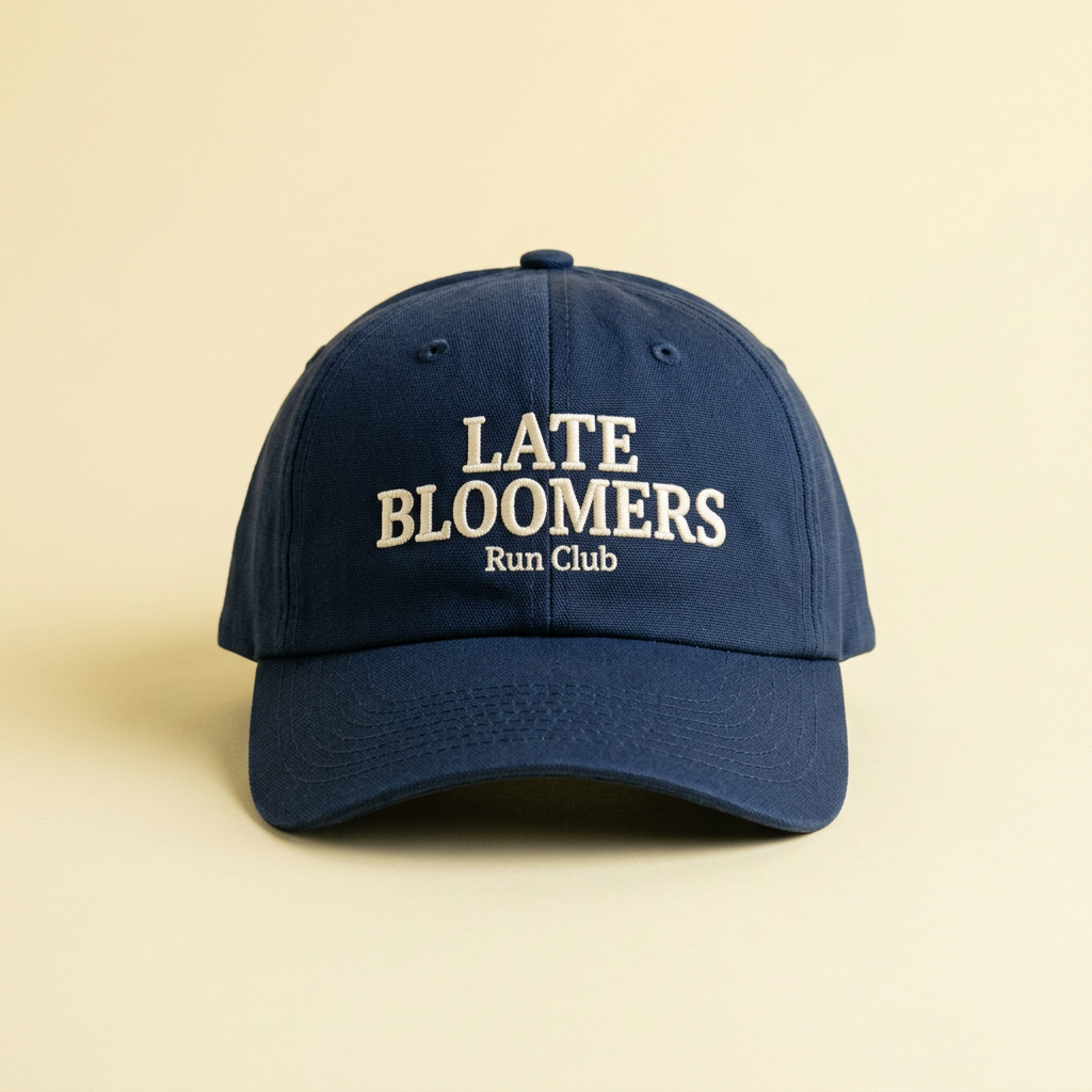 Navy cap embroidered Late Bloomers Run Club.